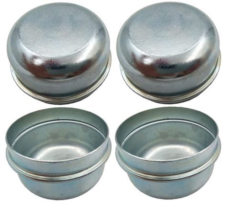 Do you fill dust cap with grease?